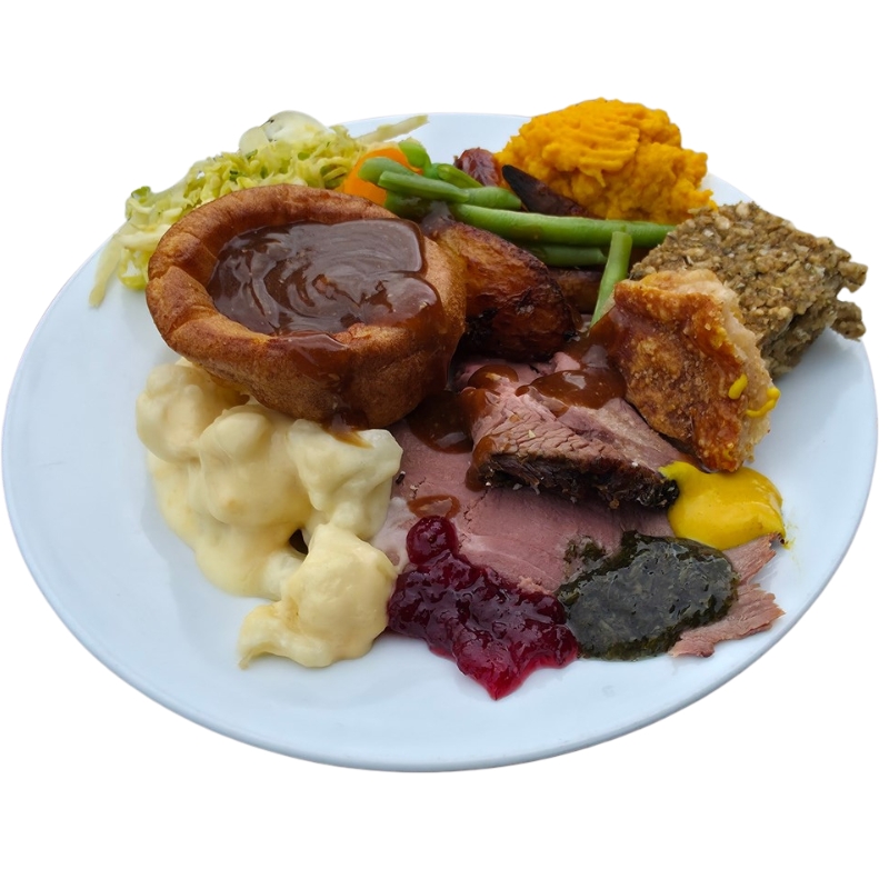 Traditional carvery plate with roast beef, Yorkshire pudding, roast potatoes and seasonal vegetables at The Quintrell Inn near Newquay, Cornwall.
